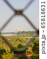 looking to taj mahal through lattice jali from the fort, Agra, Uttar Pradesh, India 65818631