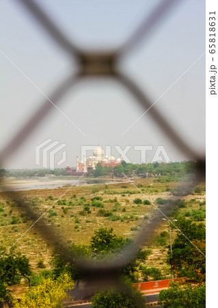 looking to taj mahal through lattice jali from the fort, Agra, Uttar Pradesh, India looking to taj mahal through lattice jali from the fort, Agra, Uttar Pradesh, India 65818631