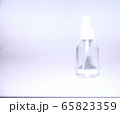clear little white spray bottle , on white background empty copy space 65823359