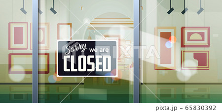 sorry we are closed sign hanging outside business office store shop or restaurant 65830392