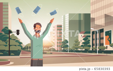 man throwing medical masks coronavirus win defeated covid-19 guy celebrating victory over nCoV 65830393