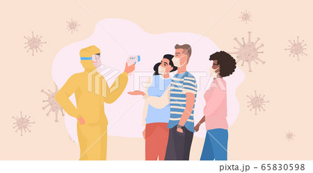 specialist in hazmat suit checking body temperature of mix race people for coronavirus symptoms covid-19 65830598