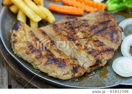 Close up of Grilled Pork Steaks Close up of Grilled Pork Steaks 65832396