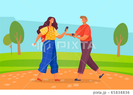 Couple Walking in Summer at Park with Smartphones 65838836