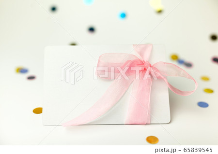 Blank White page mock up and sparkles confetti on white. Blank White page mock up and sparkles confetti on white. 65839545