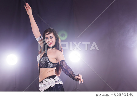 Young woman belly dancer in exotic dress with...の写真素材 [65841146] - PIXTA