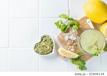 Green matcha lemonade on white background 65846138