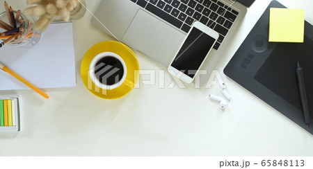 Top view creative workspace with office desk. Top view creative workspace with office desk. 65848113