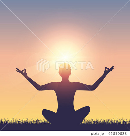 meditating person on summer meadow at sunshine 65850828