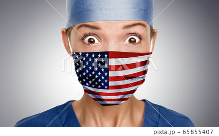 Asian American doctor shocked for COVID-19 crisis help with USA flag on surgical mask. Healthcare workers needing PPE help to fight COVID-19 Coronavirus Asian American doctor shocked for COVID-19 crisis help with USA flag on surgical mask. Healthcare workers needing PPE help to fight COVID-19 Coronavirus 65855407