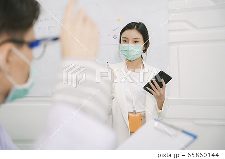 Beautiful nurse giving presentation. 65860144