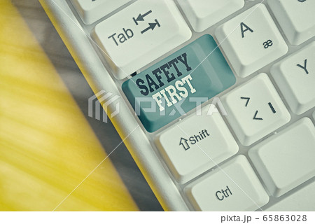 Word writing text Safety First. Business concept 65863028