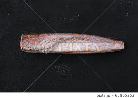 Raw hake on black background 65865252