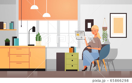 woman reading daily news on tablet pc screen press mass media newspaper concept woman reading daily news on tablet pc screen press mass media newspaper concept 65866298