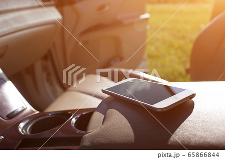 Phone is at cabin of the new car 65866844