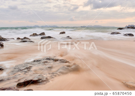 wavy seaside rocks 65870450