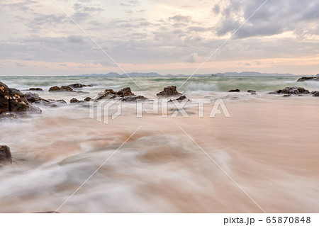 wavy seaside rocks 65870848