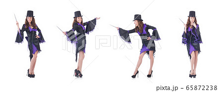 Woman magician isolated on the white 65872238