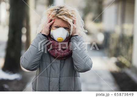 COVID-19 Pandemic Coronavirus Young girl in city COVID-19 Pandemic Coronavirus Young girl in city 65873649