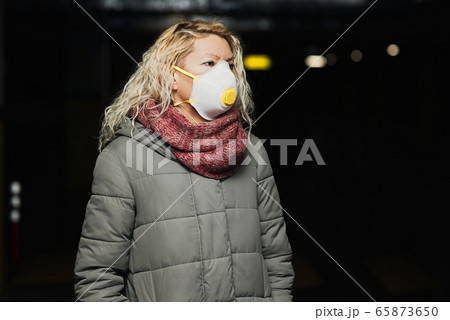 COVID-19 Pandemic Coronavirus Young girl in city 65873650