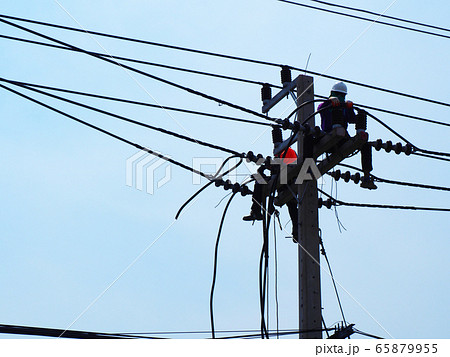 electrician man working at height and dangerous ,high voltage power line maintenance electrician man working at height and dangerous ,high voltage power line maintenance 65879955