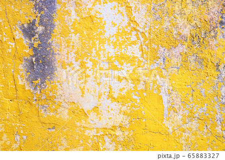 Concrete yellow colorful wall surface texture. Abstract grunge bright color background with aging effect. Copyspace. Concrete yellow colorful wall surface texture. Abstract grunge bright color background with aging effect. Copyspace. 65883327