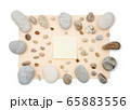 Sticky notes in the middle of sea stones 65883556