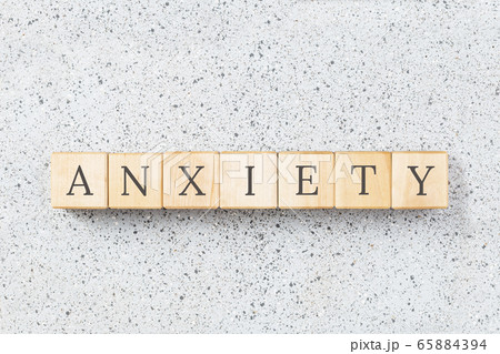 Anxiety word made with wooden blocks on grey 65884394