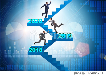 Businessman climbing stairs on yearly basis Businessman climbing stairs on yearly basis 65885701