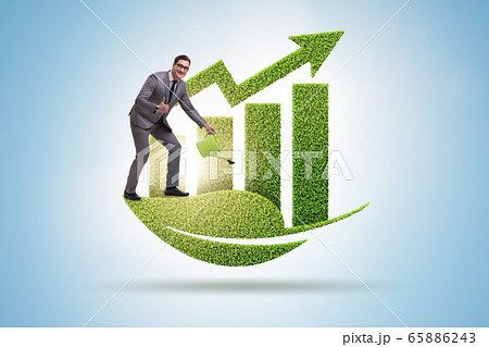 Businessman supporting green economy growth Businessman supporting green economy growth 65886243