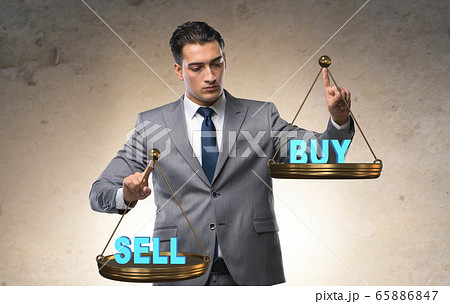 Businessman choosing between buying and selling Businessman choosing between buying and selling 65886847