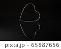 Metal heart and its reflection 65887656