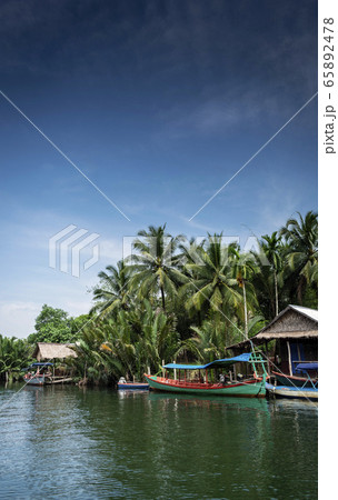 traditional jungle boat at pier on tatai river in 65892478