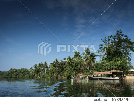 traditional jungle boat at pier on tatai river in traditional jungle boat at pier on tatai river in 65892490
