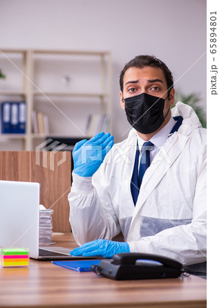 Young male employee in self-isolation concept Young male employee in self-isolation concept 65894801