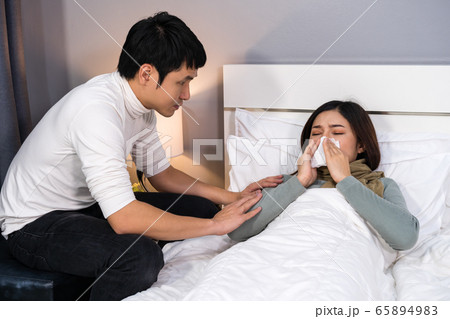 husband visiting and take care his sick wife while 65894983