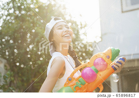 Lively woman in Songkran day. 65896817