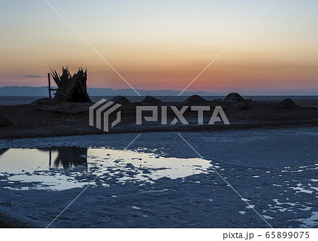 Sunrise over the salt lake of El Jerid. Sunrise over the salt lake of El Jerid. 65899075