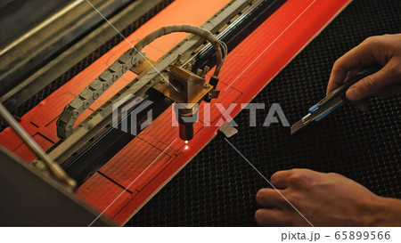 Industrial laser engraving on a paperboard 65899566
