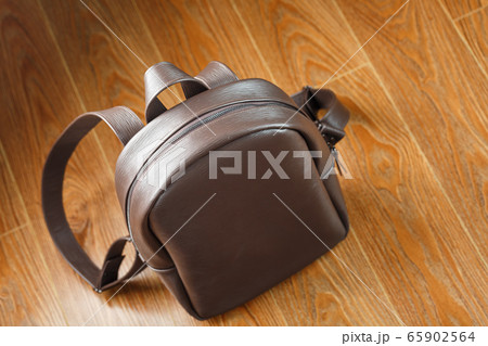 Leather backpack or satchel made of brown leather Leather backpack or satchel made of brown leather 65902564