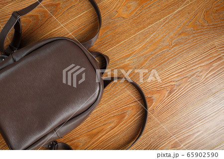 Leather backpack or satchel made of brown leather 65902590