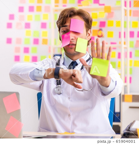 Male doctor with many conflicting prioritites 65904001