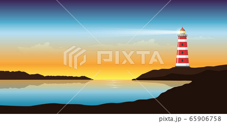 lighthouse by the ocean at beautiful sunset seascape 65906758
