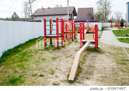 quarantined playground on spring day 65907467
