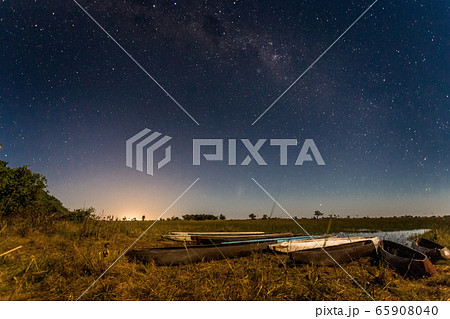 Botswanian local mokoro boats under the starlight Botswanian local mokoro boats under the starlight 65908040