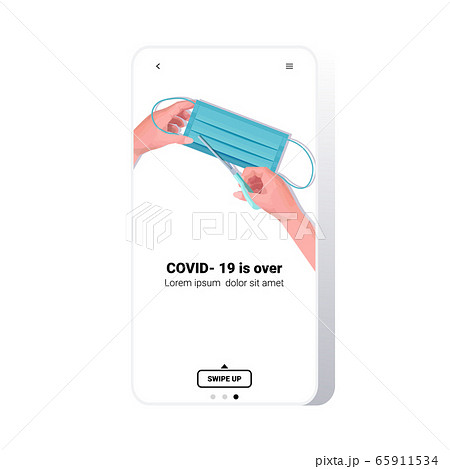 hands cutting medical mask with scissors covid-19 pandemic is over coronavirus quarantine ending concept hands cutting medical mask with scissors covid-19 pandemic is over coronavirus quarantine ending concept 65911534