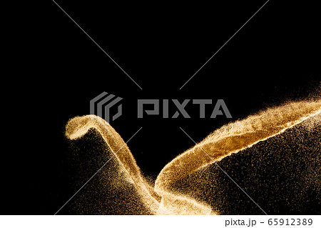 Brown colored sand splash.Dry river sand explosion Brown colored sand splash.Dry river sand explosion 65912389