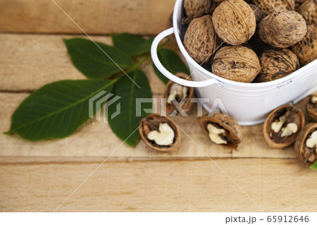 Walnuts and leaves 65912646