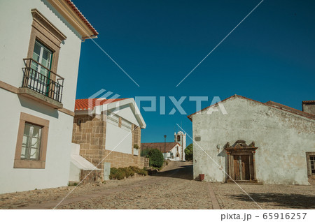 Whitewashed wall in old houses and entrance in Marvao Whitewashed wall in old houses and entrance in Marvao 65916257