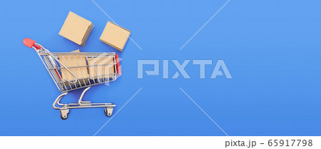 Trolley with boxes. Internet shopping concept 65917798